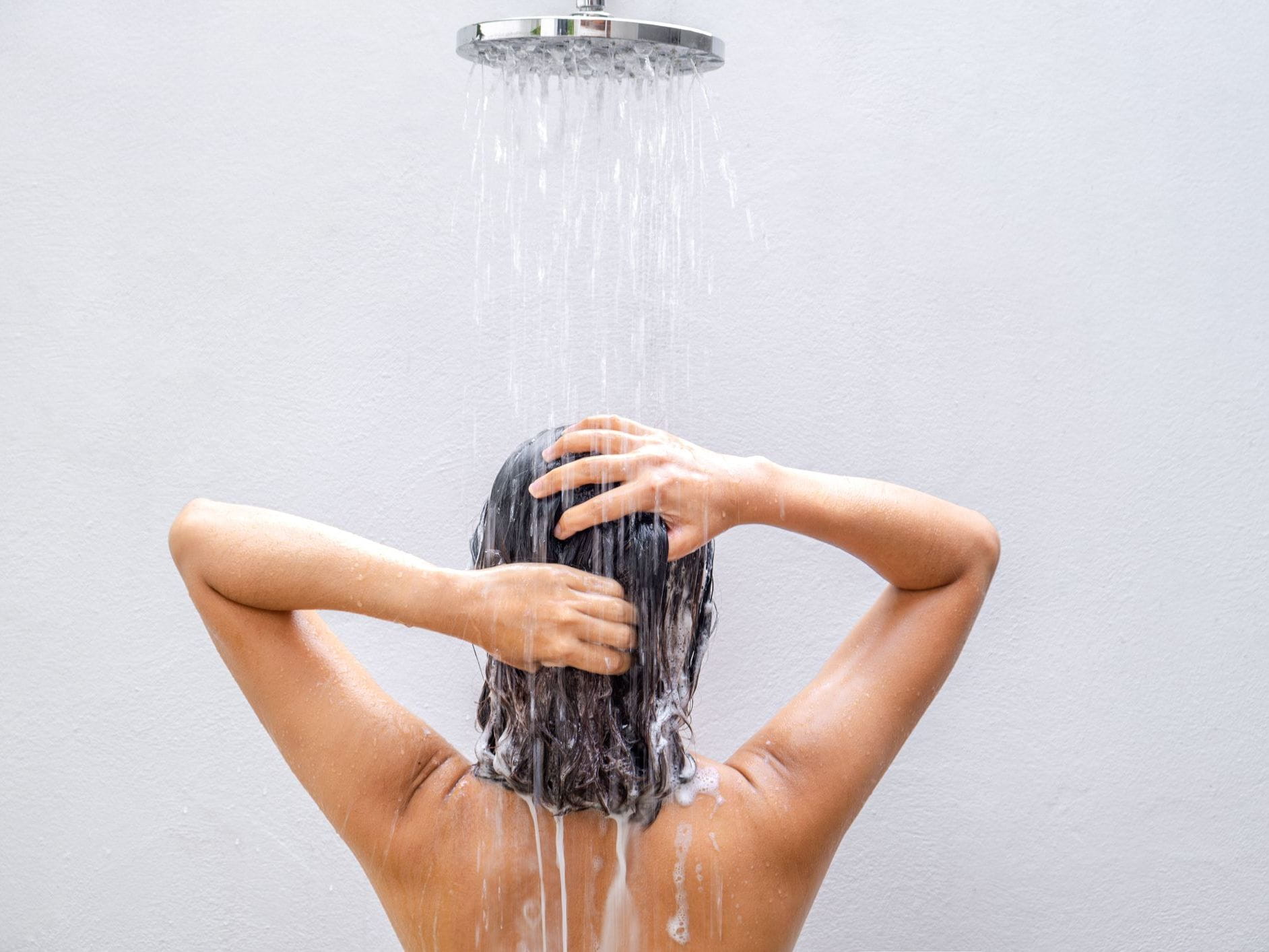 lathering hair rinse woman