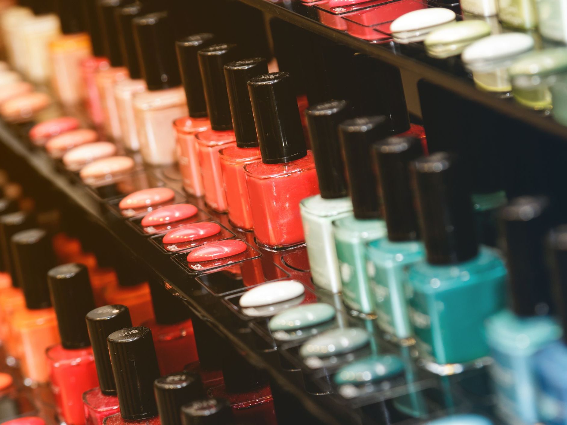 colorful nail polish display on shelf