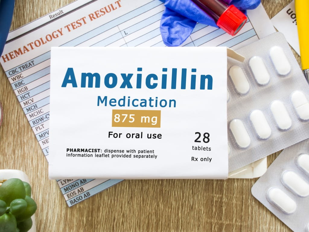 amoxicillin package and pills