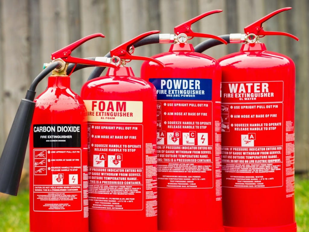 fire extinguisher safety different types of fire extinguishers lined up