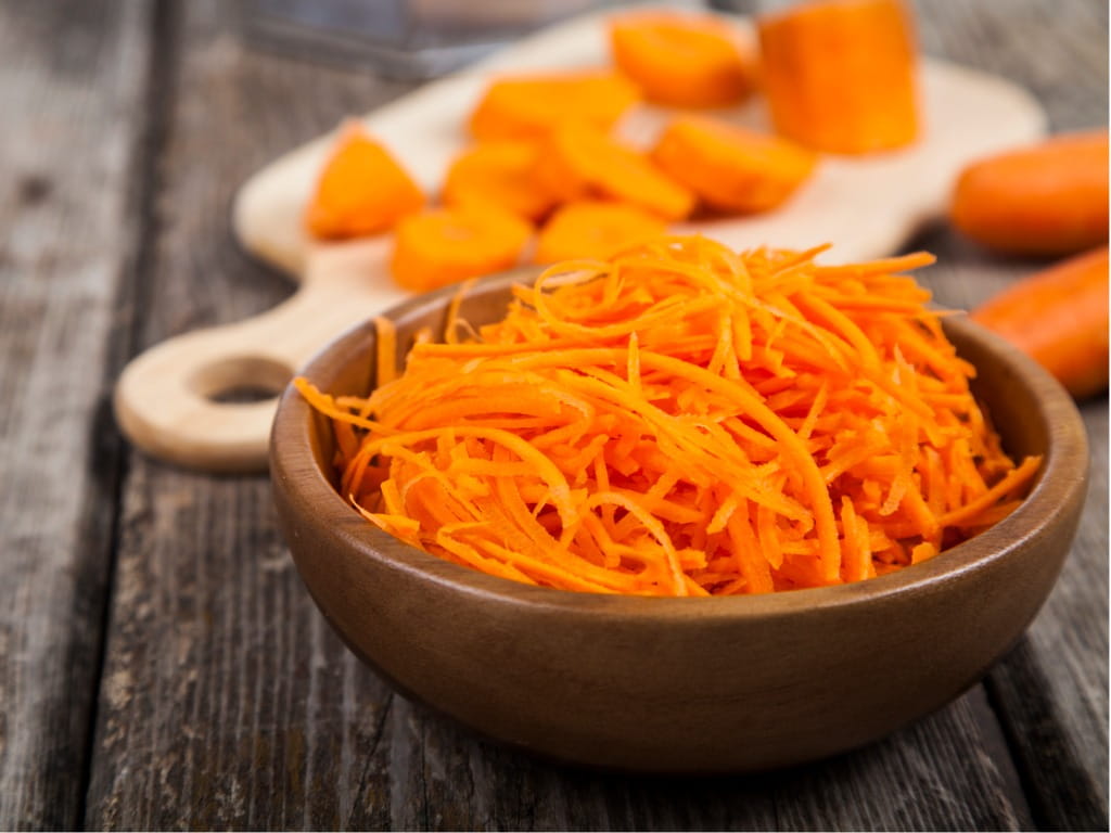 grated carrots in a bowl