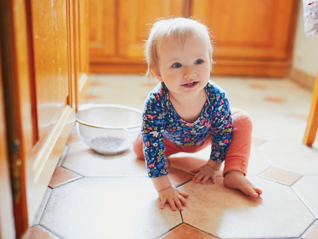 ant bait safe around children baby on kitchen floor