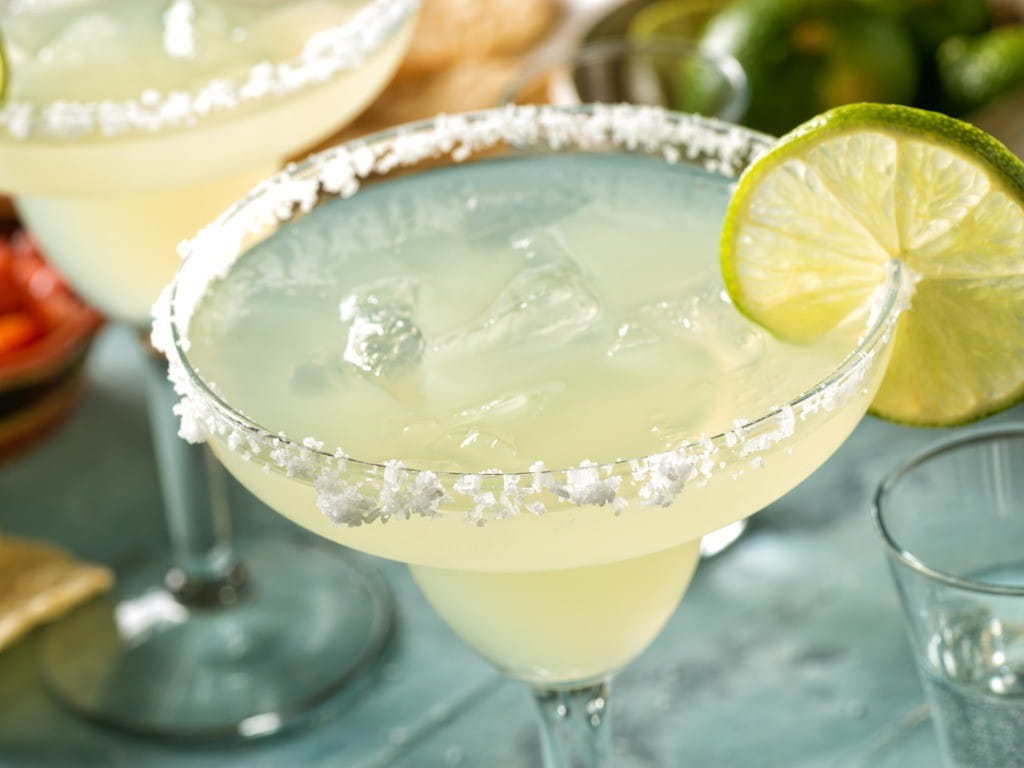 phytophotodermatitis margarita with lime on outdoor table