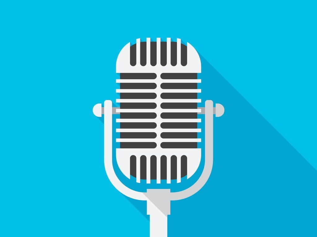 podcasting microphone on blue background