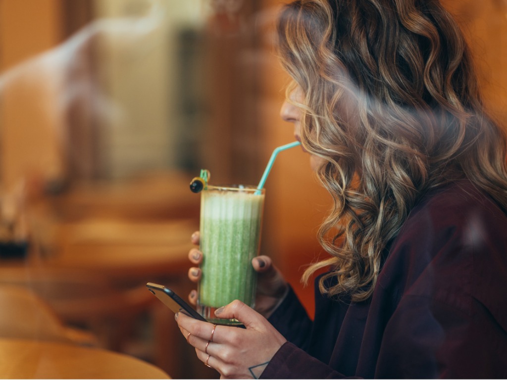 woman drinking matcha tea